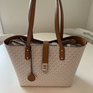 Authentic Micheal Kors Tote purchased at Dillard’s